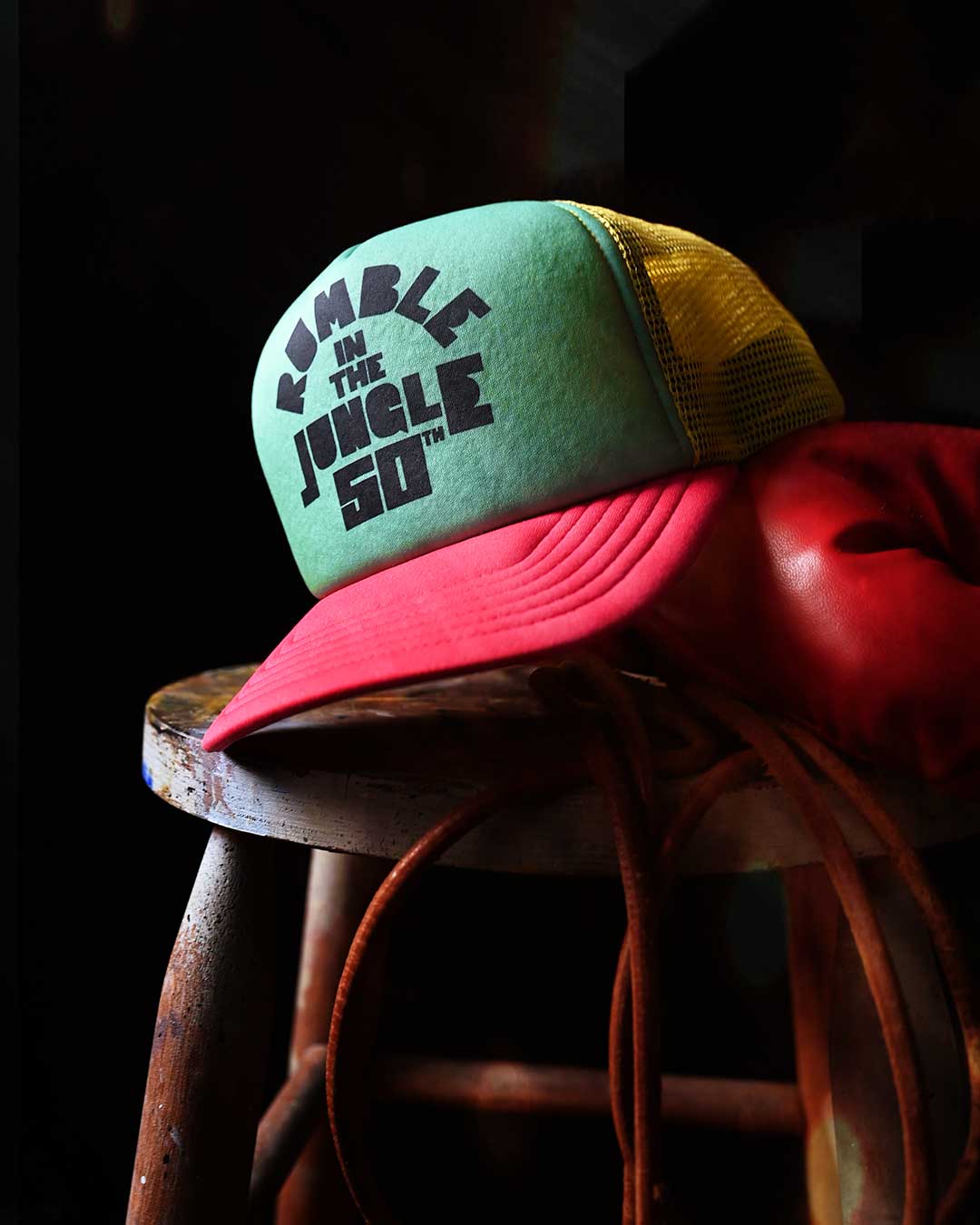 50th Anniversary Rumble In The Jungle Trucker Hat - Roots of Fight