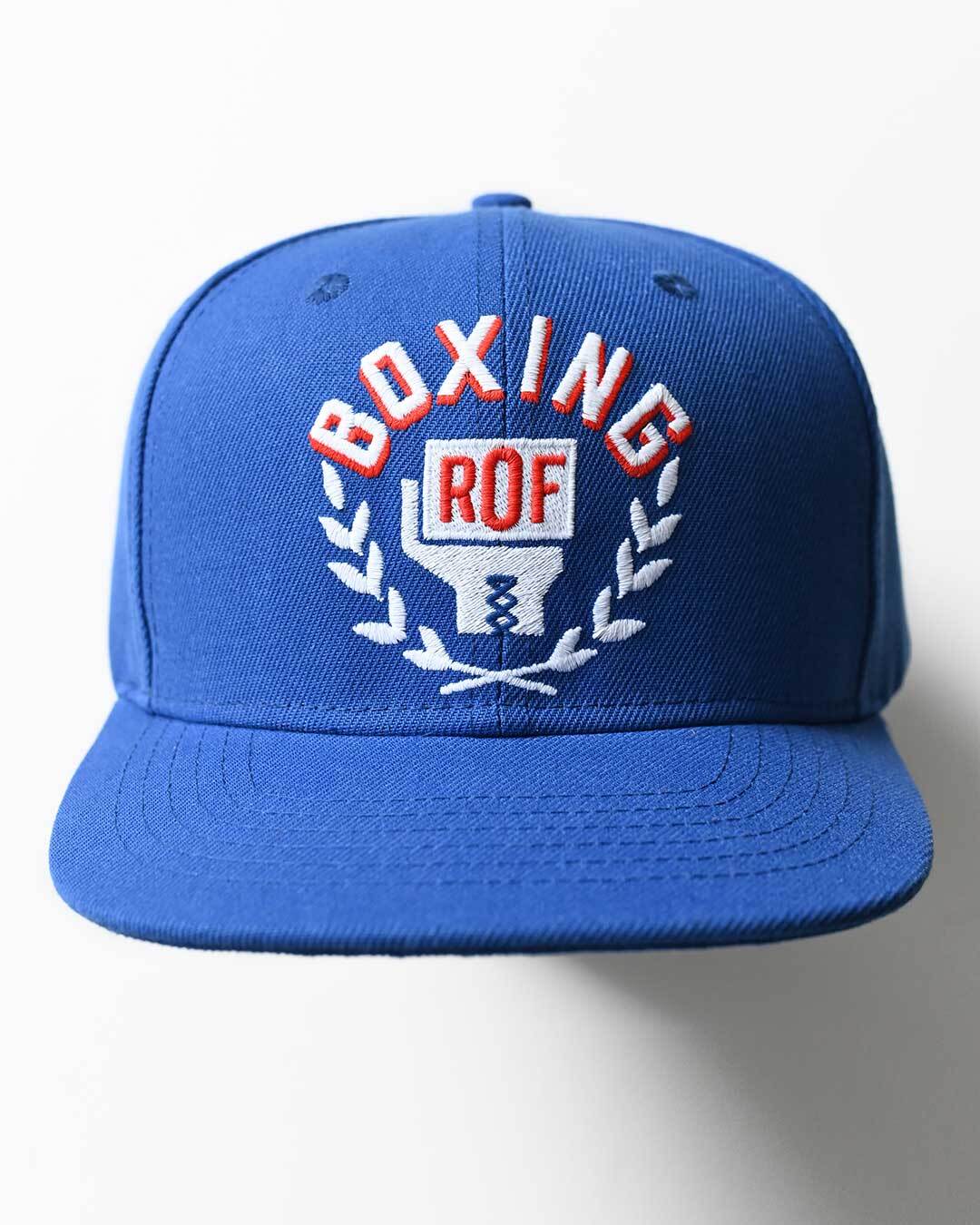 Blue baseball cap with 'Boxing ROF' embroidered in red and white.